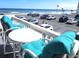 Relaxing balcony view features cushioned seating, ocean views, and nearby parking at this oceanside location at 2800 N Atlantic Ave # 212, Daytona Beach, FL 32118