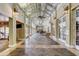 Bright hallway with tile floors, high ceilings, decorative lighting and multiple doors and windows throughout at 430 Cypress Hills Way, Deland, FL 32724