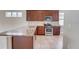 Spacious kitchen features granite countertops, stainless steel appliances, and ample cabinet space for storage at 430 Cypress Hills Way, Deland, FL 32724