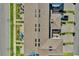 Overhead view of townhome rooftops, landscaping, walkways, and carports in the community at 635 Belgrove St, Debary, FL 32713