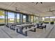 Spacious clubhouse with picnic tables and ceiling fans for gatherings and leisurely enjoyment of community lake views at 635 Belgrove St, Debary, FL 32713
