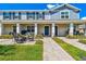 Charming townhome exterior with a cozy patio area and well-maintained landscaping at 635 Belgrove St, Debary, FL 32713