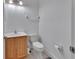 Bathroom features modern fixtures, including a sink, toilet, and vanity at 955 N Ridgewood Ave, Deland, FL 32720