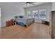 Bedroom with hardwood floors, plenty of light and ceiling fan at 955 N Ridgewood Ave, Deland, FL 32720