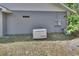 Exterior view of home generator for emergency power backup at 955 N Ridgewood Ave, Deland, FL 32720
