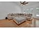 Bright and spacious living room with hardwood floors and ample seating at 955 N Ridgewood Ave, Deland, FL 32720