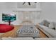 Inviting living room with modern decor, high ceilings, and natural light at 955 N Ridgewood Ave, Deland, FL 32720