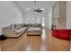 Comfortable living room featuring a stone fireplace, wood floors and lots of seating at 955 N Ridgewood Ave, Deland, FL 32720
