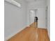 Room with a mirrored door and wood flooring at 955 N Ridgewood Ave, Deland, FL 32720