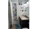 Bathroom with granite countertop vanity, medicine cabinet, and large linen closet at 115 Cypress Pond Rd, Port Orange, FL 32128