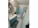 Blue bathroom with shower/tub combo and vanity at 115 Cypress Pond Rd, Port Orange, FL 32128