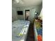 Bedroom with a view into the kitchen and a dresser at 115 Cypress Pond Rd, Port Orange, FL 32128