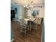 Bright dining area with wood floors and chandelier at 115 Cypress Pond Rd, Port Orange, FL 32128