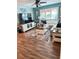 Comfortable living room with a large sectional sofa and bright natural light at 115 Cypress Pond Rd, Port Orange, FL 32128