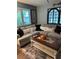 Cozy living room featuring sectional sofa and coffee table at 115 Cypress Pond Rd, Port Orange, FL 32128