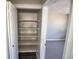 Empty pantry with four shelves at 1199 Deltona Blvd, Deltona, FL 32725