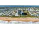 Beachfront building, pool, and coastal view at 1513 Ocean Shore Blvd # 2B, Ormond Beach, FL 32176
