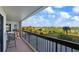 Relax on the balcony with outdoor seating and a view of the surroundings at 1513 Ocean Shore Blvd # 2B, Ormond Beach, FL 32176