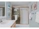 Clean and bright bathroom with shower and vanity at 1513 Ocean Shore Blvd # 2B, Ormond Beach, FL 32176