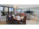 Charming dining area with wood table and ocean view at 1513 Ocean Shore Blvd # 2B, Ormond Beach, FL 32176