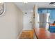 Bright entryway with tile flooring and access to kitchen and living areas at 1513 Ocean Shore Blvd # 2B, Ormond Beach, FL 32176