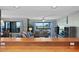 Living room with ocean view, comfy seating, and a large TV at 1513 Ocean Shore Blvd # 2B, Ormond Beach, FL 32176
