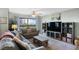 Cozy living room featuring a fireplace and ocean view at 1513 Ocean Shore Blvd # 2B, Ormond Beach, FL 32176