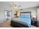 Main bedroom with king bed, ocean view, and private balcony access at 1513 Ocean Shore Blvd # 2B, Ormond Beach, FL 32176