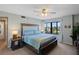 King bedroom with ocean view, and ceiling fan at 1513 Ocean Shore Blvd # 2B, Ormond Beach, FL 32176