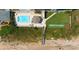 Community pool, deck area, walkway to beach at 1513 Ocean Shore Blvd # 2B, Ormond Beach, FL 32176