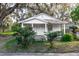 White house with front porch,needs renovations, located on a grassy lot at 1603 W 16Th St, Sanford, FL 32771