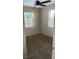 Bedroom featuring two windows and carpet at 1649 W Waycross Cir, Deltona, FL 32725