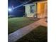 Front yard with walkway and lighting at 1649 W Waycross Cir, Deltona, FL 32725