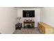 Living room area featuring a large television and classic furniture pieces at 1649 W Waycross Cir, Deltona, FL 32725