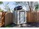 Backyard shed with storage container on top at 1649 W Waycross Cir, Deltona, FL 32725