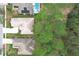 High-angle view of homes with private backyard and pool at 189 Perfect Dr, Daytona Beach, FL 32124
