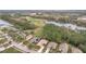 Aerial view of property and surrounding area, near golf course at 189 Perfect Dr, Daytona Beach, FL 32124
