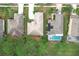 Aerial view of houses with pools and lush green landscaping at 189 Perfect Dr, Daytona Beach, FL 32124