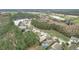 Aerial view showcasing homes, landscape, and a golf course at 189 Perfect Dr, Daytona Beach, FL 32124