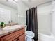 Small bathroom with single vanity and shower/tub combo at 189 Perfect Dr, Daytona Beach, FL 32124