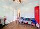 Bedroom with tile floors and a red locker at 189 Perfect Dr, Daytona Beach, FL 32124