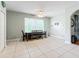 Bright dining area with tile floors and a view to the backyard at 189 Perfect Dr, Daytona Beach, FL 32124