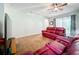 Living room showcasing a large TV and comfortable red leather furniture at 189 Perfect Dr, Daytona Beach, FL 32124