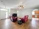 Relaxing living room featuring two red leather recliners and tile floors at 189 Perfect Dr, Daytona Beach, FL 32124