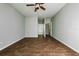 Large, open room with wood-look tile flooring, perfect for any purpose at 189 Perfect Dr, Daytona Beach, FL 32124