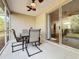 Relaxing screened porch with patio furniture and access to interior at 189 Perfect Dr, Daytona Beach, FL 32124