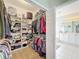 Well-organized walk-in closet with ample shelving and hanging space at 189 Perfect Dr, Daytona Beach, FL 32124