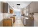 Kitchen with granite countertops and gray cabinets at 1911 S Palomar Dr, Deltona, FL 32738