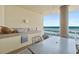 Oceanfront balcony with outdoor grill and seating area at 1925 S Atlantic Ave # 706, Daytona Beach, FL 32118