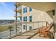 Private balcony with chairs and partial ocean view at 1925 S Atlantic Ave # 706, Daytona Beach, FL 32118